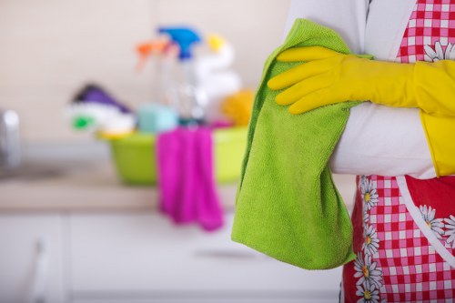 Cleaner treating stains on a hallway carpet in Kentishtown