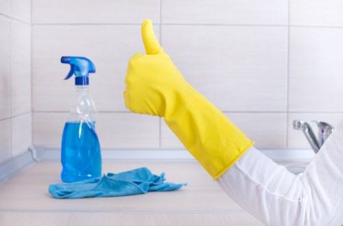 Technician cleaning a carpet in a local flat in Kentishtown