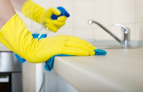 Cleaner completing a final safe work check before finishing